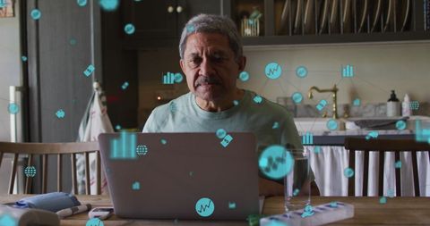 Senior man analyzing financial data on laptop with digital icons