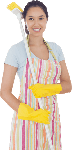 Smiling woman holding broom with yellow gloves and striped apron