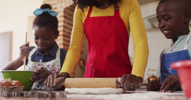 Mother and Kids Baking Together in Kitchen with Smiling Faces - Download Free Stock Images Pikwizard.com