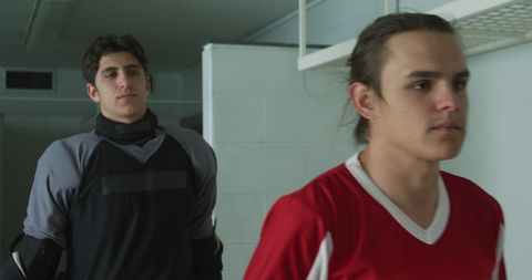 Young Male Hockey Players Walking in a Locker Room - Download Free Stock Images Pikwizard.com
