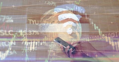 Dark-skinned hand tapping smartphone with globe and financial charts overlay
