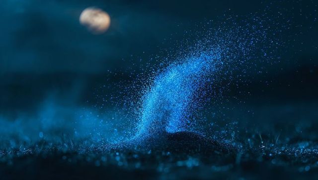 Mystical Swirling Particles Under Pale Moonlight