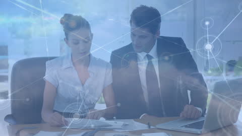 Business Professionals Discussing Innovative Digital Networking Solutions