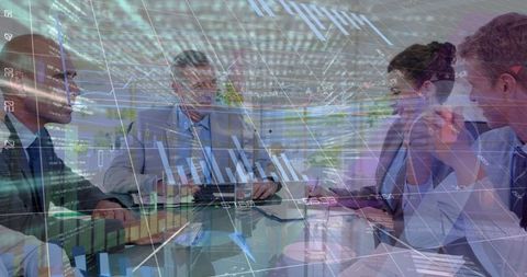 Diverse Business Meeting with Data Integration Visuals - Download Free Stock Images Pikwizard.com