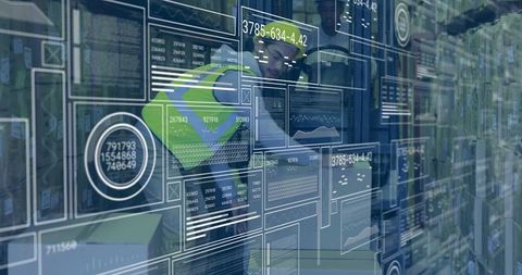 Technician Using Tablet for Inventory in Digitally Integrated Warehouse