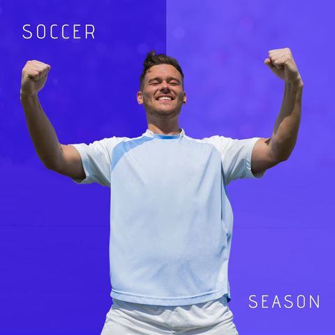 Cheerful male soccer player celebrating victory