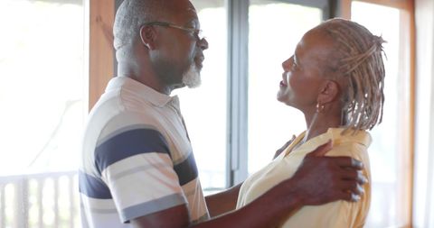 Joyful African American Senior Couple Embracing at Home - Download Free Stock Images Pikwizard.com