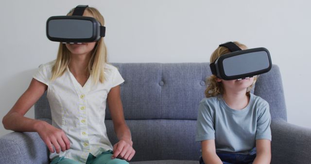 Kids Enjoying Virtual Reality Headsets on Couch - Download Free Stock Images Pikwizard.com