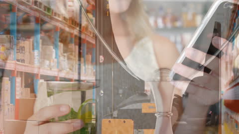 Mixed Media Concept of Shopping with Smartphone and Warehouse Background