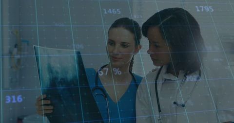 Doctors Analyzing X-ray With Digital Data Overlay in Modern Clinic