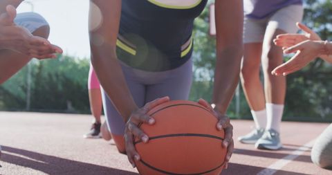 Female Players Practicing Basketball Techniques on Outdoor Court