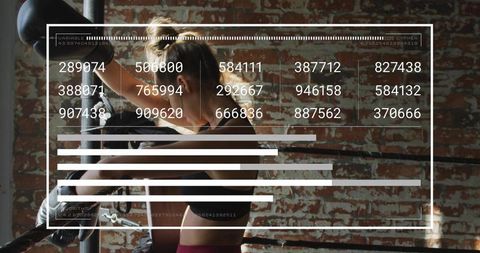 Female boxer adjusting gloves in gritty brick gym ring with hud data overlay