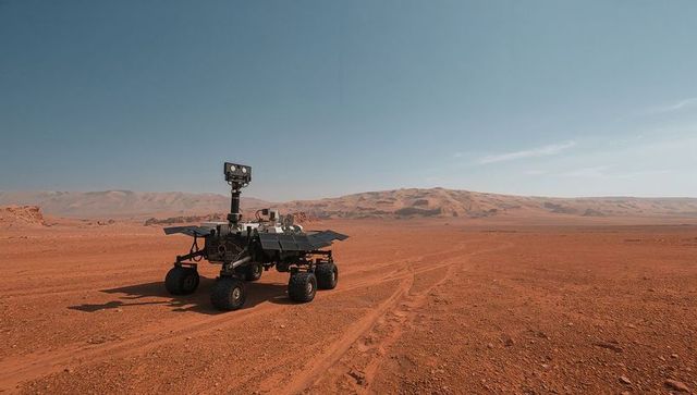 Mars rover in crater harvesting solar energy