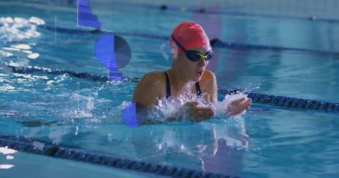 Competitive Swimmer Practicing Technique in Pool