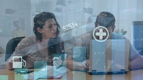 Couple Analyzing Data with Transparent Digital Interface