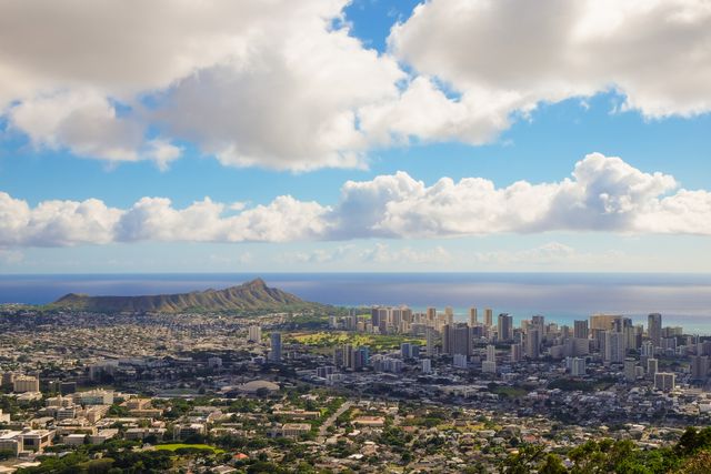 Panoramic View of Honolulu with Diamond Head Crater and Scattered Clouds - Download Free Stock Photos Pikwizard.com