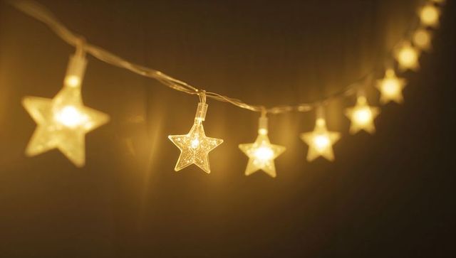 Glowing Star LED Garland Creating Warm Ambient Bokeh Lighting for Home Decor