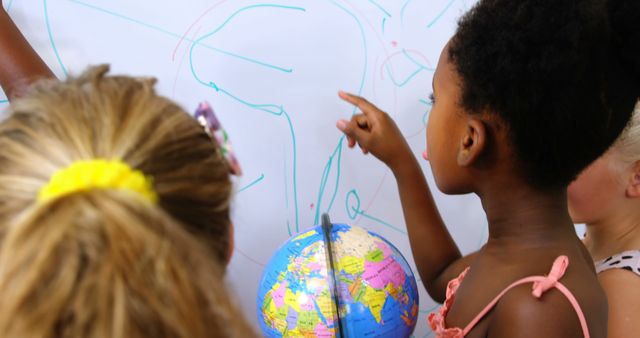 Diverse Kids Learning Geography With World Map and Globe - Download Free Stock Images Pikwizard.com