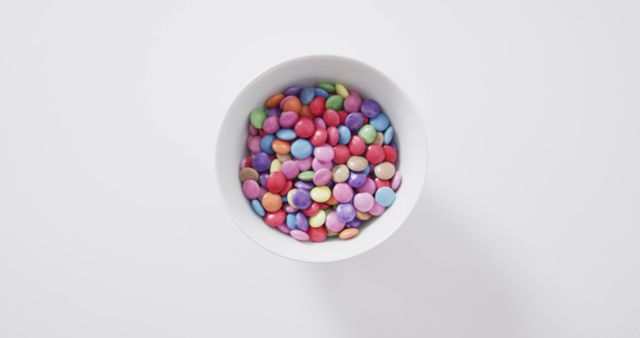 Colorful Candy in White Bowl on White Background - Download Free Stock Images Pikwizard.com