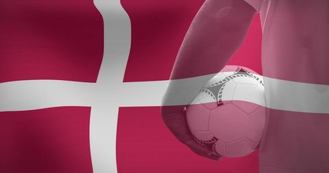 Danish pride: football player with flag background