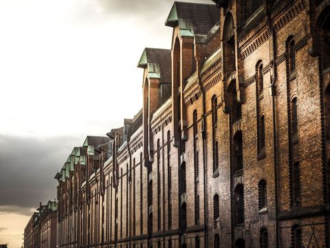 Historic Brick Warehouse Buildings at Sunset - Download Free Stock Images Pikwizard.com