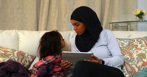 Mother and Daughter Spending Quality Time with Tablet