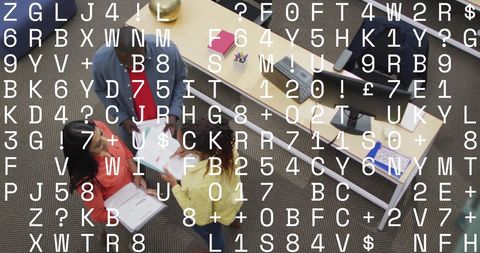 Diverse Team Innovating in Tech-Focused Office Environment