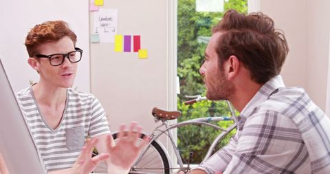 Creative Team Discussing Ideas in Modern Office Space