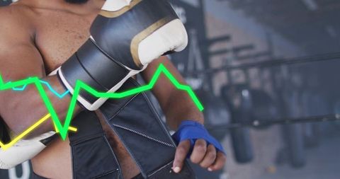 Boxer Raising Glove in Ring with Neon Performance Graph Overlay Showing Intensity