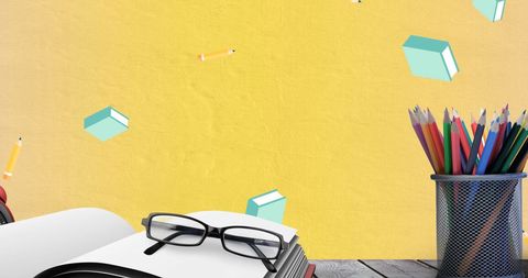 Neat Desk with Books, Glasses, and Pencils on Yellow - Download Free Stock Images Pikwizard.com