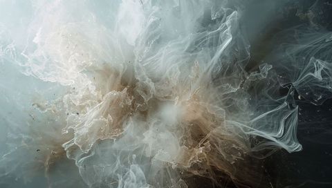 Translucent Nebula Swirling and Diffusing Beige Teal Ink Waves in Liquid