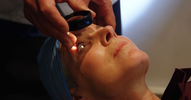 Ophthalmologist Examining Eyes of Female Patient with Flashlight - Download Free Stock Images Pikwizard.com