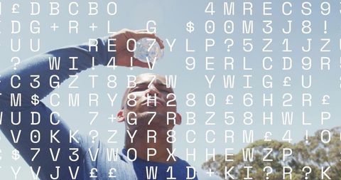 Man sipping water while holding bottle with alphanumeric overlay against blue sky