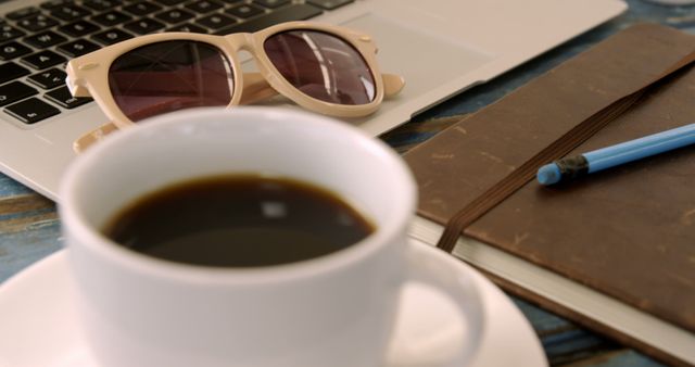 Workspace Essentials with Coffee, Sunglasses, Notebook, and Laptop - Download Free Stock Images Pikwizard.com