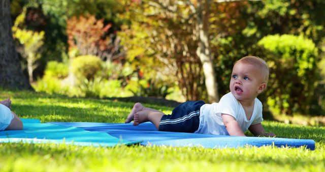 Adorable Baby Playing on Yoga Mat in Green Park - Download Free Stock Images Pikwizard.com