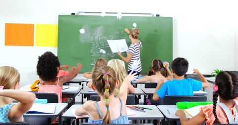 Playful Schoolchildren Throw Paper Balls in Classroom - Download Free Stock Images Pikwizard.com