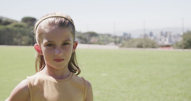 Confident Schoolgirl Enjoying Physical Education in Urban Park - Download Free Stock Images Pikwizard.com