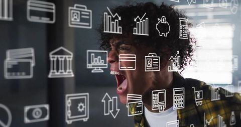 Frustrated man yelling with digital financial icons overlay
