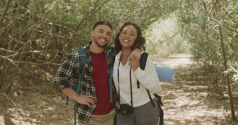 Smiling Couple on Scenic Forest Hiking Adventure - Download Free Stock Images Pikwizard.com