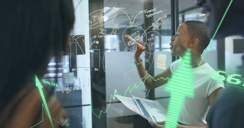 Diverse individuals analyzing financial data in office setting
