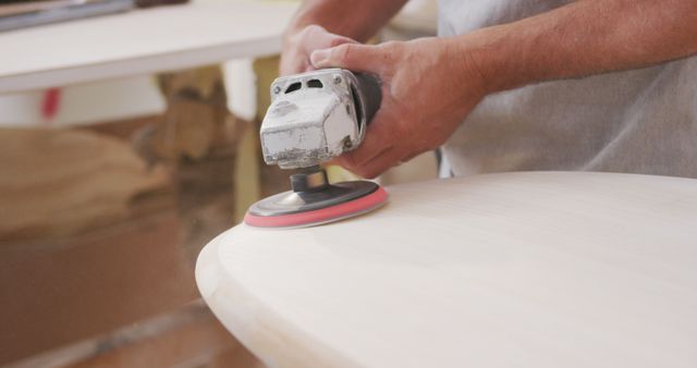 Hands Polishing Wooden Surface with Electric Sander - Download Free Stock Images Pikwizard.com