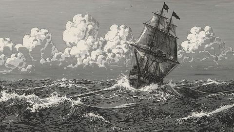 Vintage sea voyages: three-masted sailing pirate ship on rough ocean waves