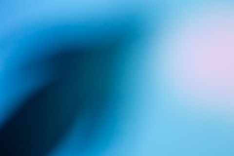 Abstract blue gradient with soft pastel accents