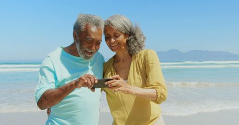 Senior Couple Enjoying Selfie Time at Beach - Download Free Stock Images Pikwizard.com