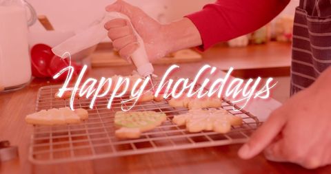Festive Christmas Cookie Decorating with Happy Holidays Message - Download Free Stock Images Pikwizard.com