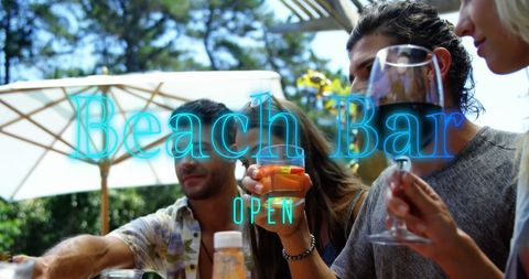 Celebrating world cocktail day at sunny beach bar gathering