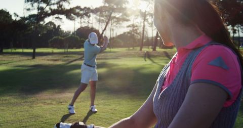 Golfers Enjoying Game at Scenic Sunset Course - Download Free Stock Images Pikwizard.com