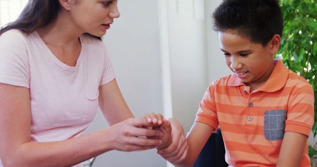 Female Therapist Working with Young Boy in Therapy Session - Download Free Stock Images Pikwizard.com