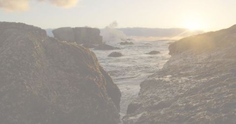 Sunset over Rocky Coast with Patriotic Accents