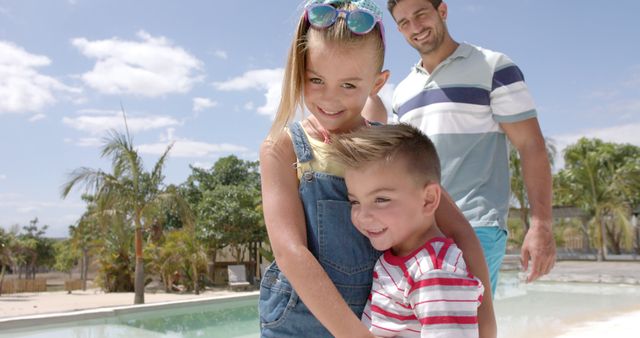 Smiling Siblings at Tropical Resort Pool with Happy Father - Download Free Stock Images Pikwizard.com